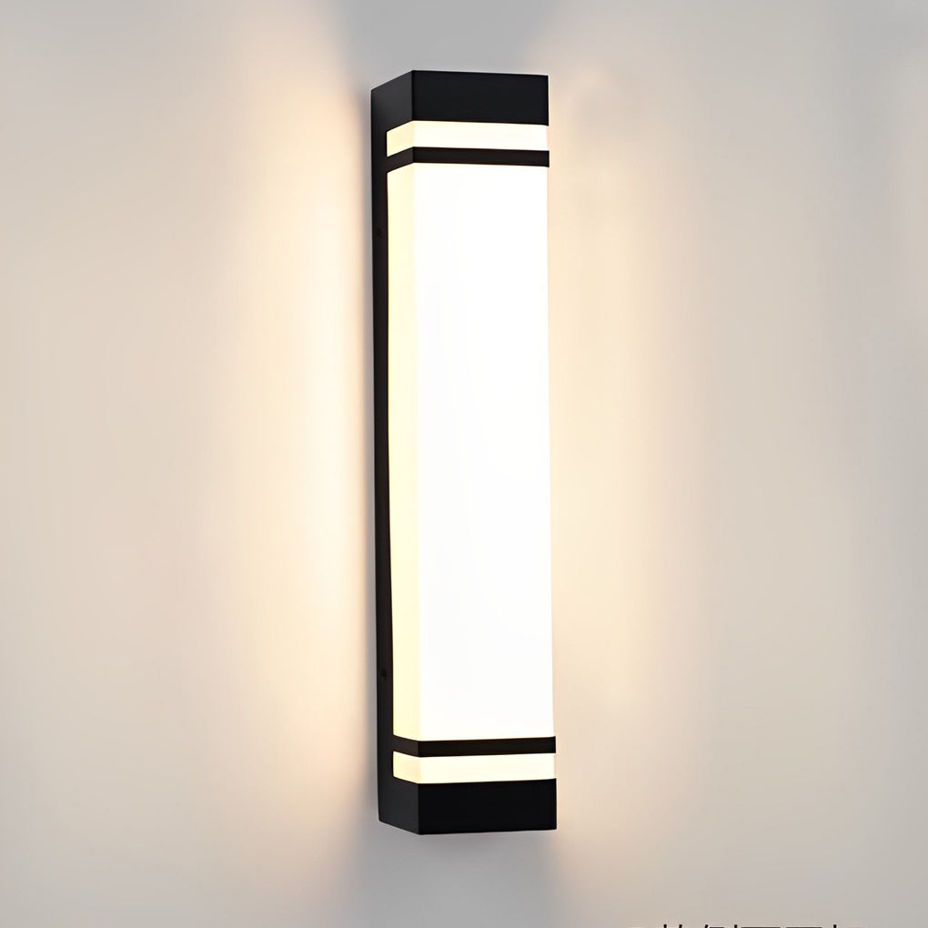 Vertical wall lighting installed on a white wall, highlighting its modern and streamlined design.