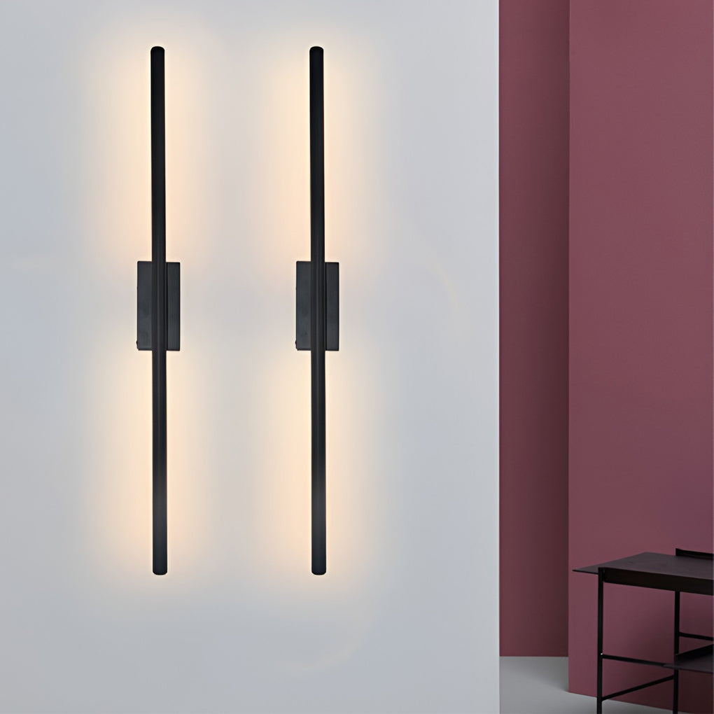 Vertical wall lights illuminating a chic dressing area with ambient light.