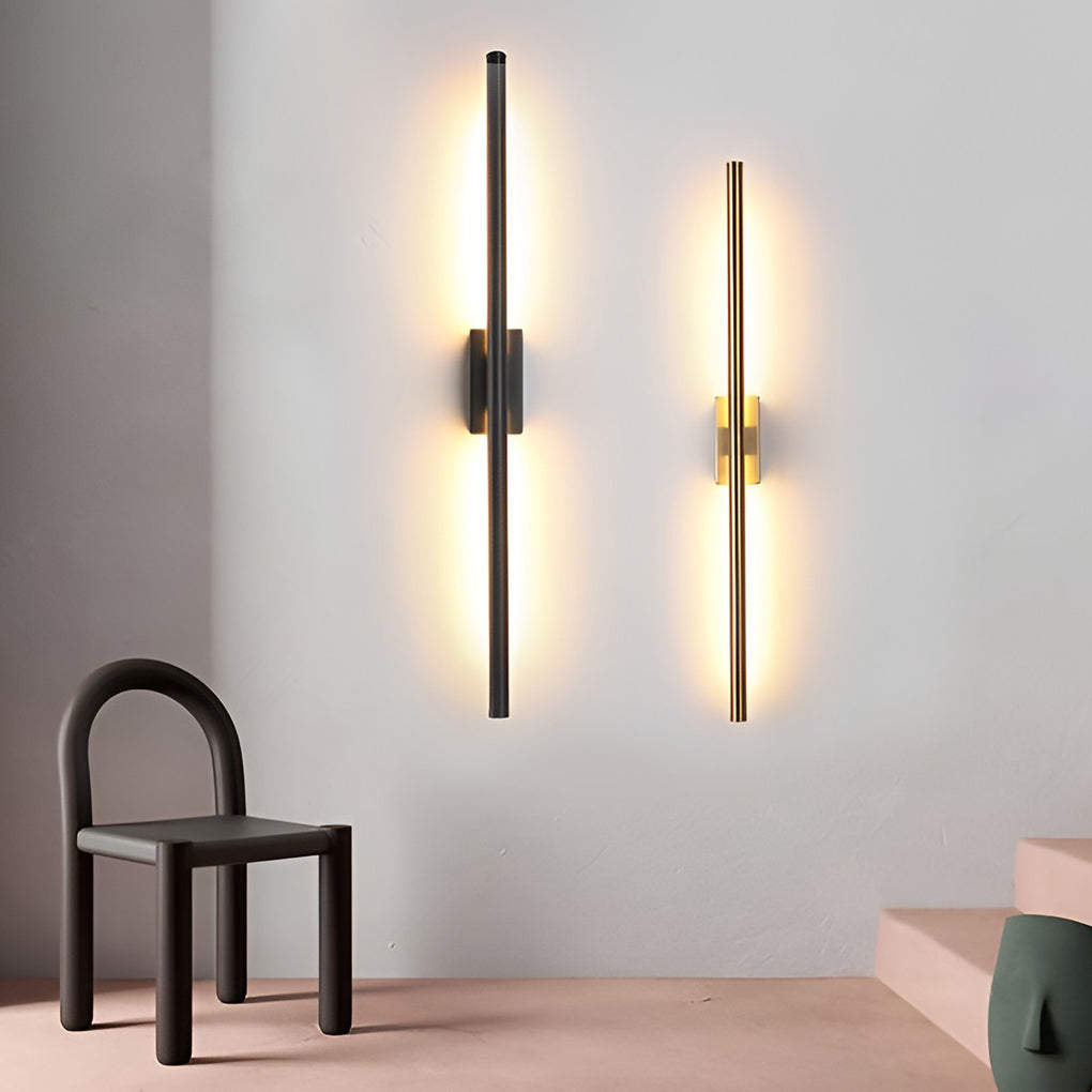 Vertical wall lights providing soft illumination in a stylish bedroom.
