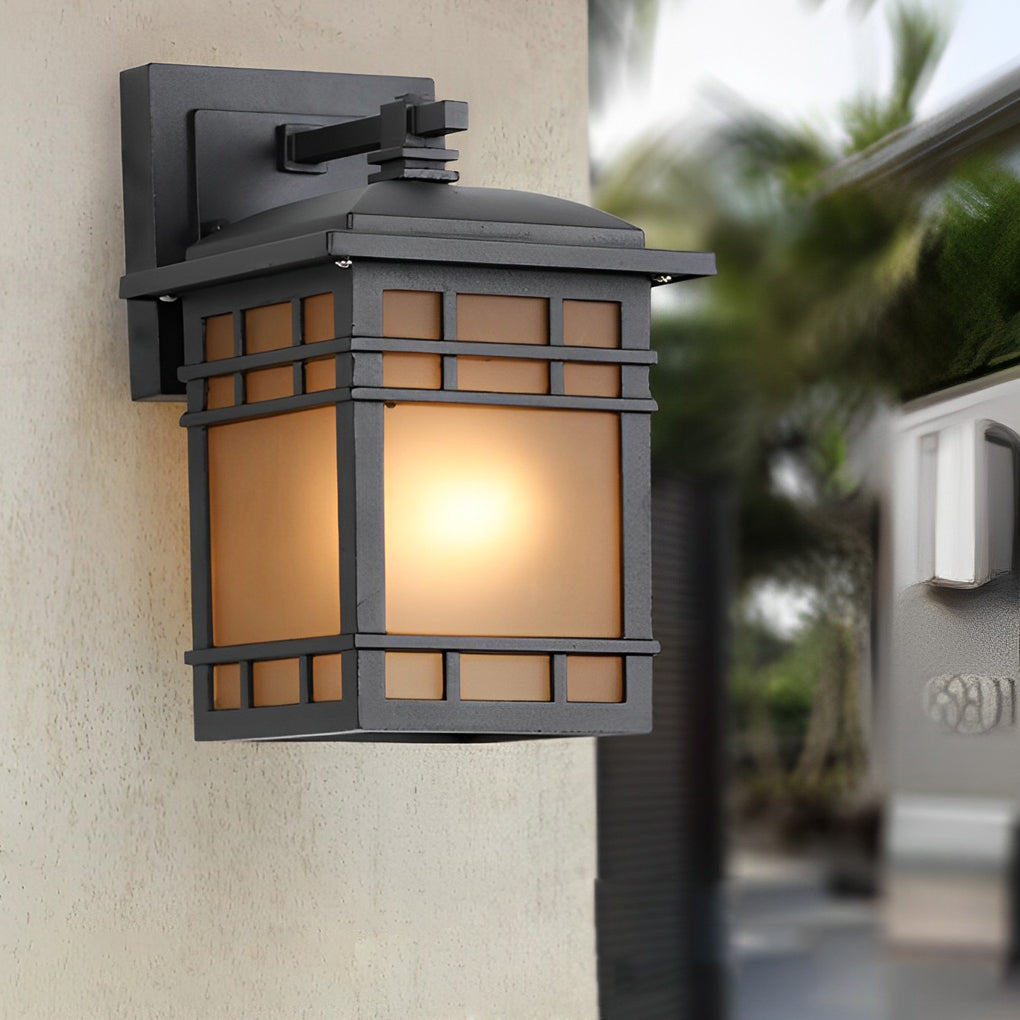 Vintage wall lantern with a rustic design, illuminating a garden pathway.