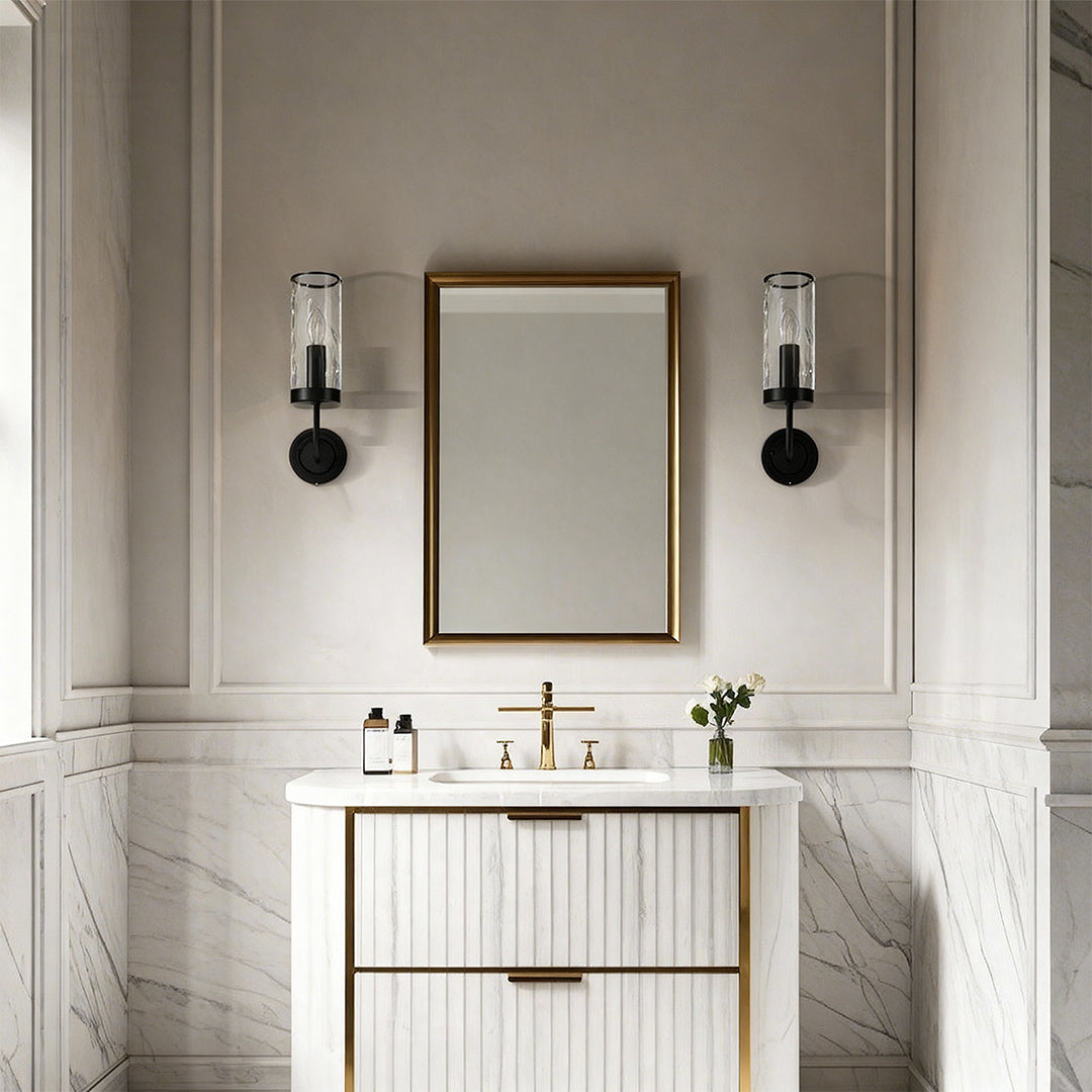 Wall glass light pair flanking bathroom mirror in classic white interior.