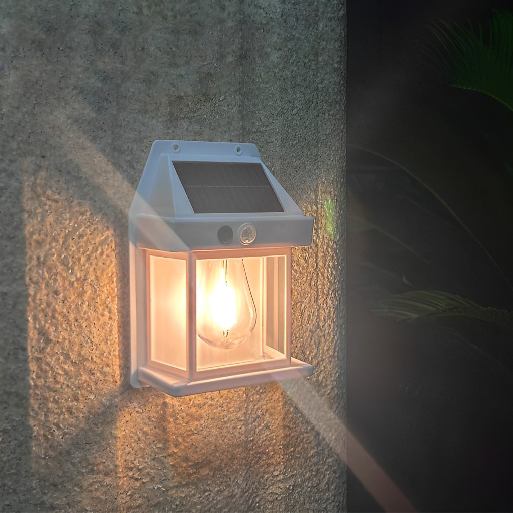 Wall mount solar lantern with a black frame and warm light for garden ambiance.
