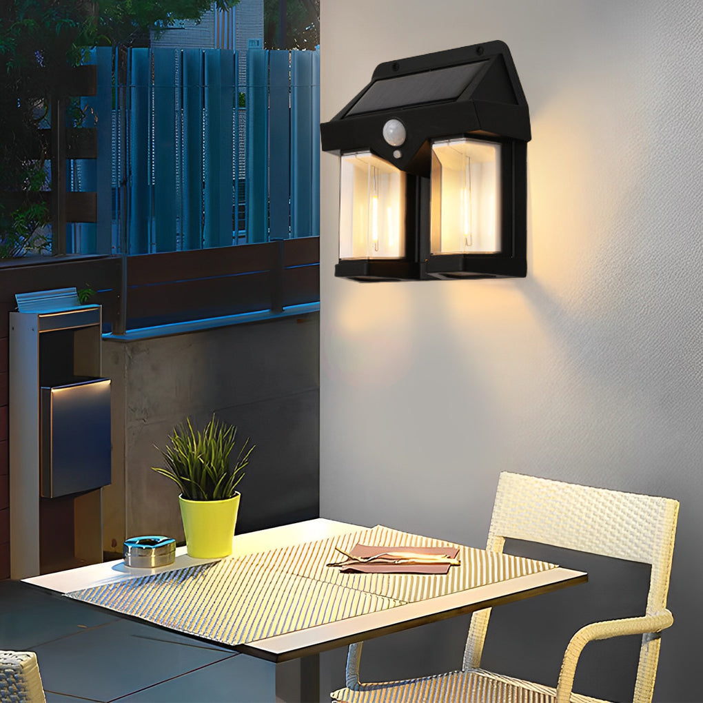 Wall mount solar lantern with a black metal frame and warm light for entrances.