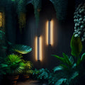 Wall mounted linear lights providing ambient glow in moody interior with lush tropical greenery