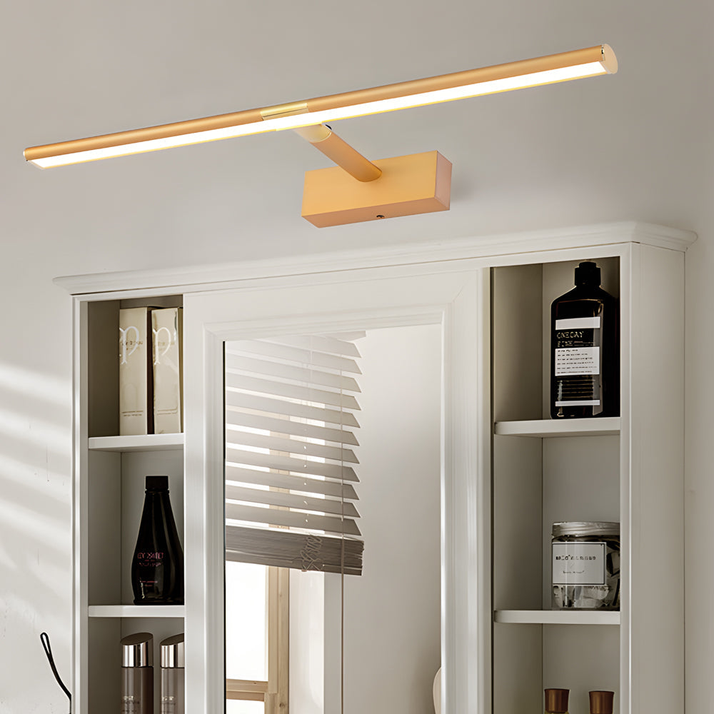 Wall mounted vanity light positioned above sink in a master bathroom.