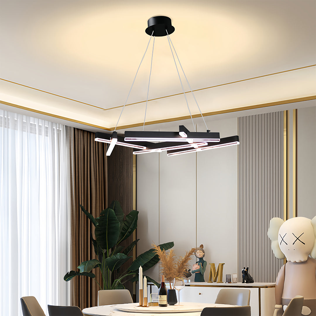Warm living space showcasing small black pendant light with contemporary chandelier styling