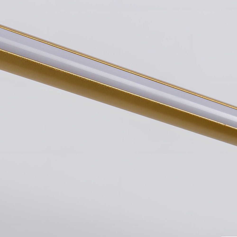 Modern bathroom vanity light strip in a warm gold tone, providing ambient light for a bathroom mirror area.