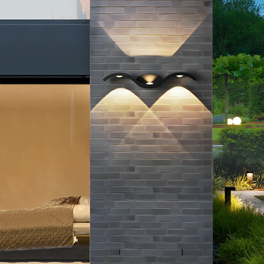 Wave wall sconce above a bed in a contemporary bedroom, creating a calm and cozy indoor lighting atmosphere.