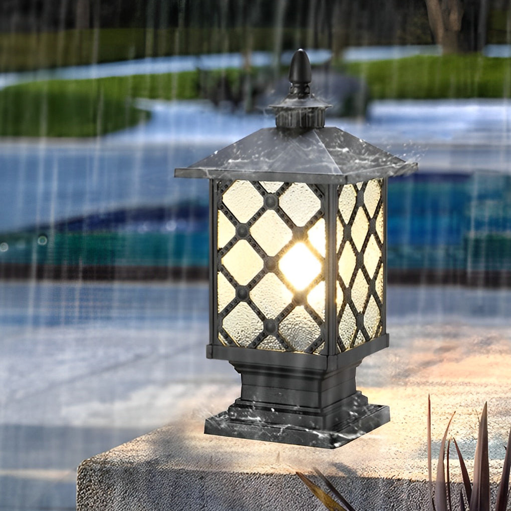 Weather-resistant street light pillar operating in rainy outdoor conditions.