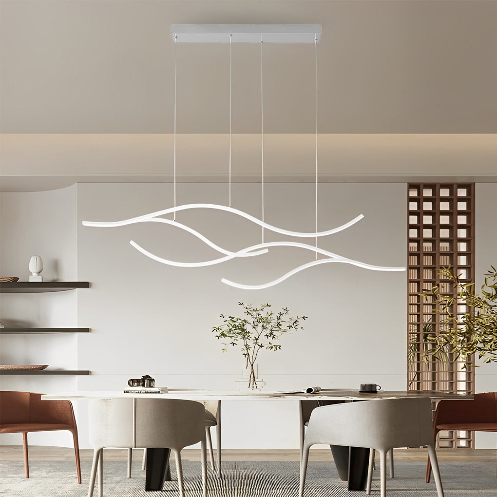 White curved LED pendant light in a bright modern dining room interior.