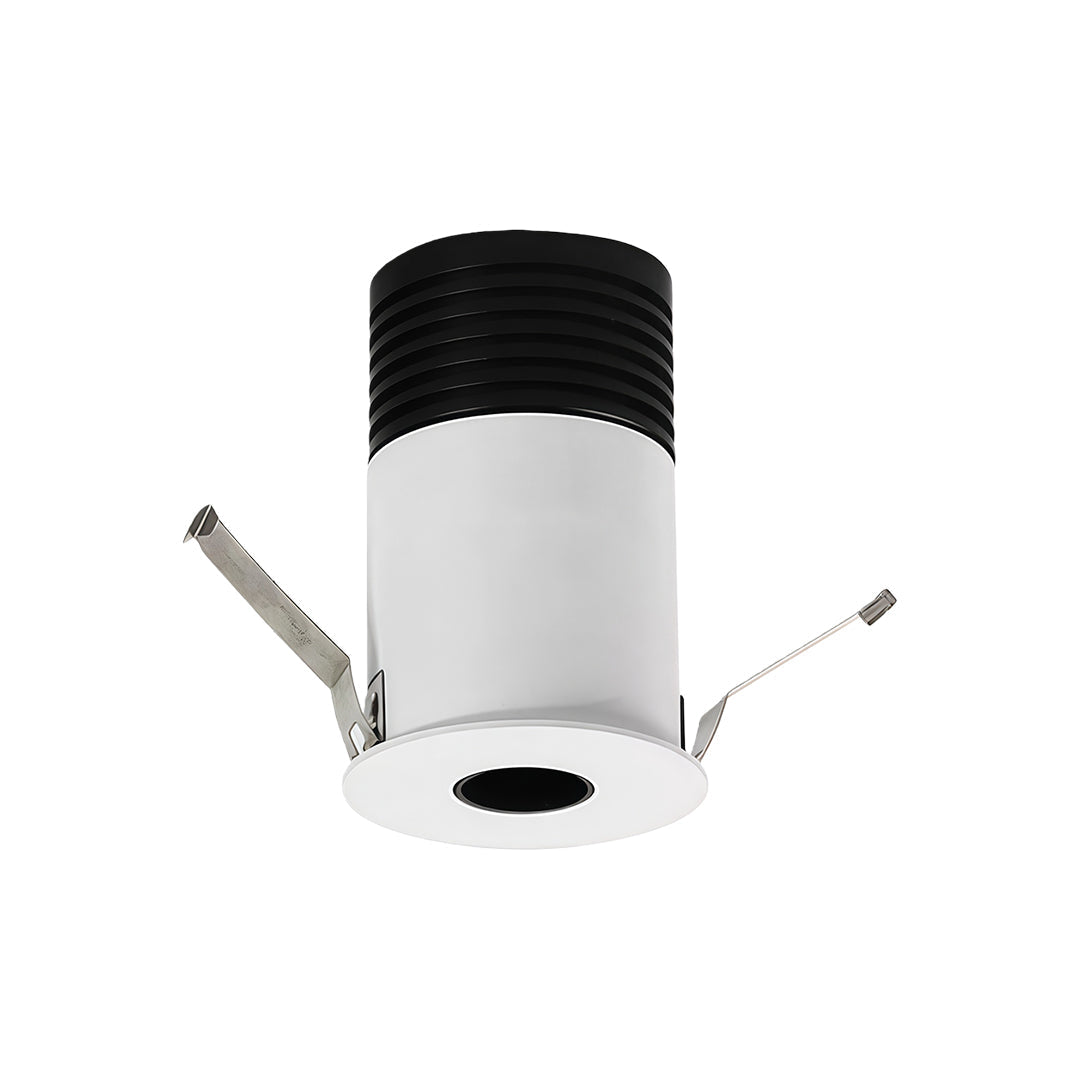 Recessed LED ceiling light with white cylindrical housing and black heat sink with adjustable mounting clips.