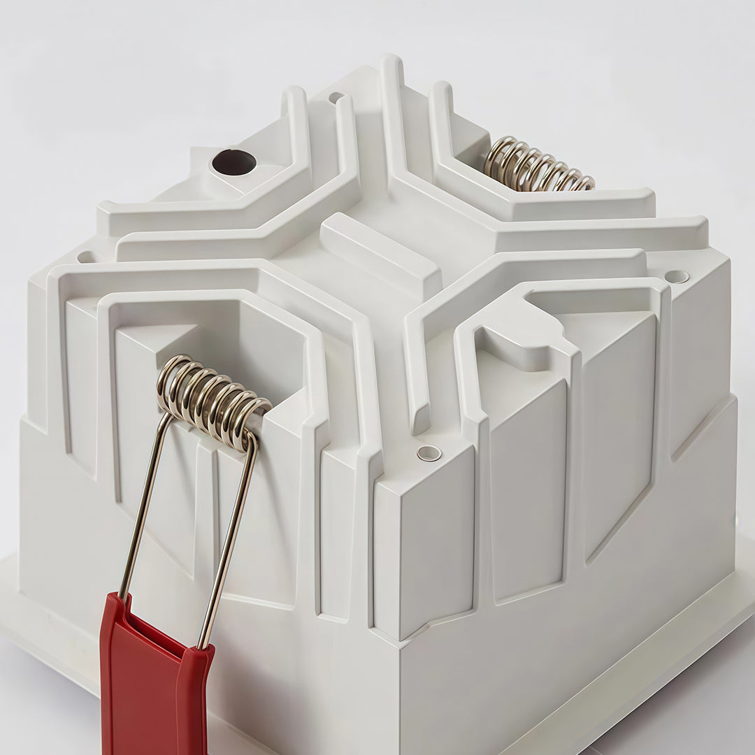 White square LED downlights housing with installation clips ensures secure fitting, easy setup, and a clean finish for modern ceiling lighting projects.