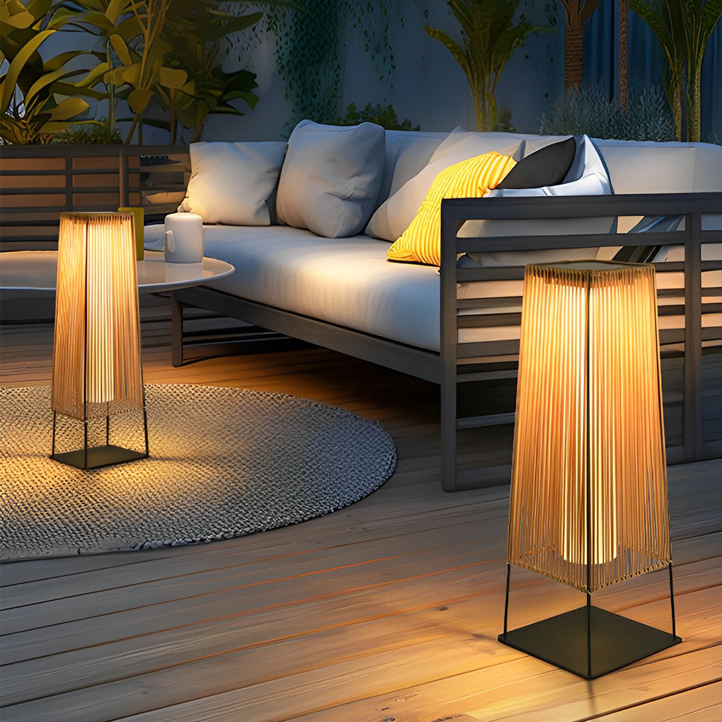 Woven floor lamp with a close-up of its solar panel and woven structure.