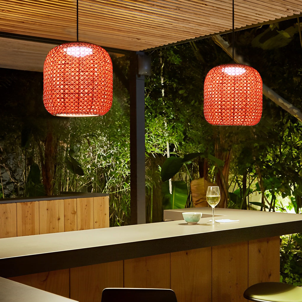 Woven hanging lantern with a close-up of its detailed red woven structure.